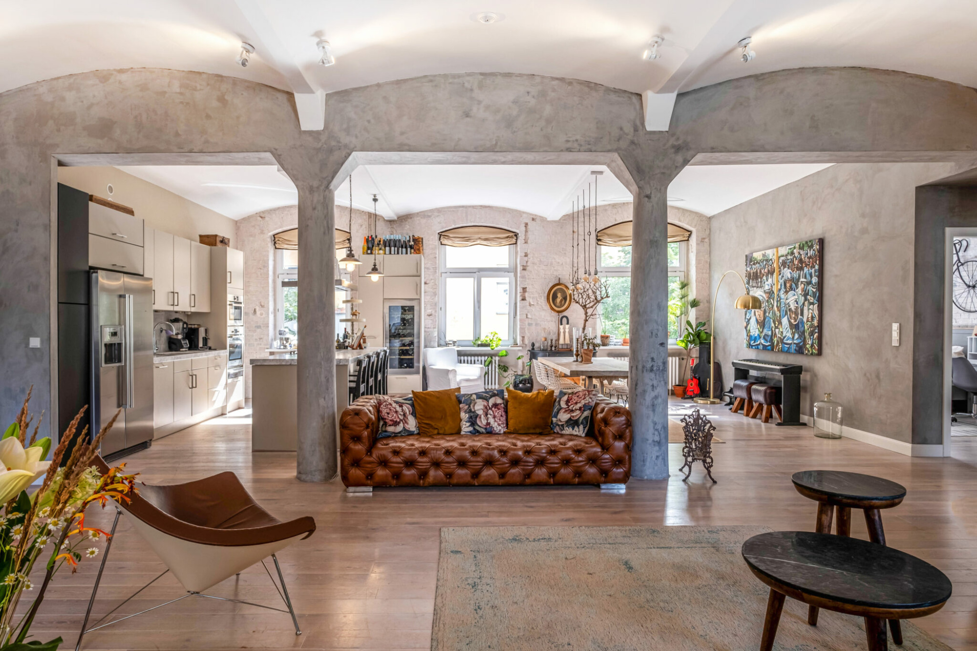 A stunning renovated factory loft with historical details in the sought-after neighborhood