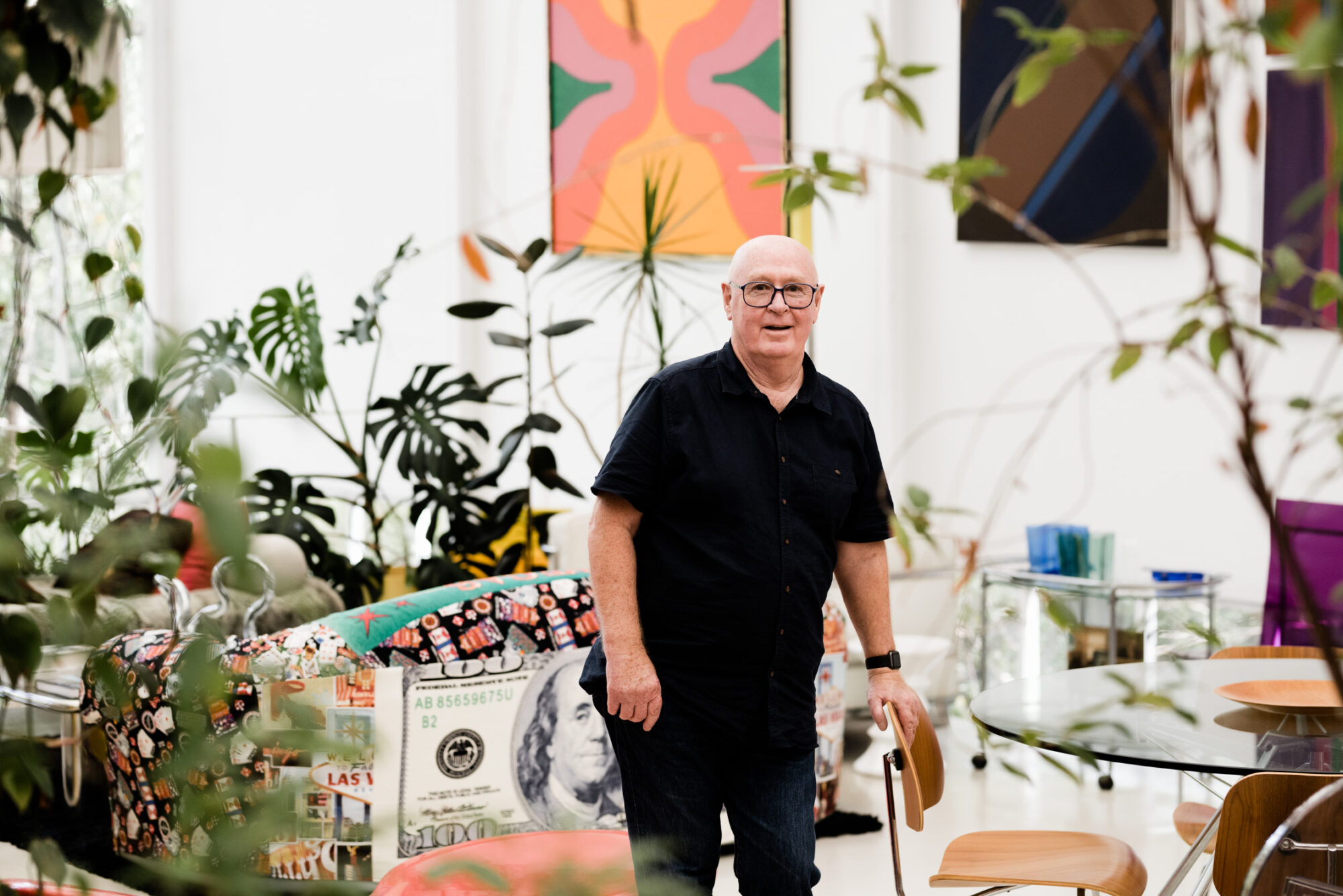 Creating walls out of canvases and cardboard chairs with Australian architect John Henry